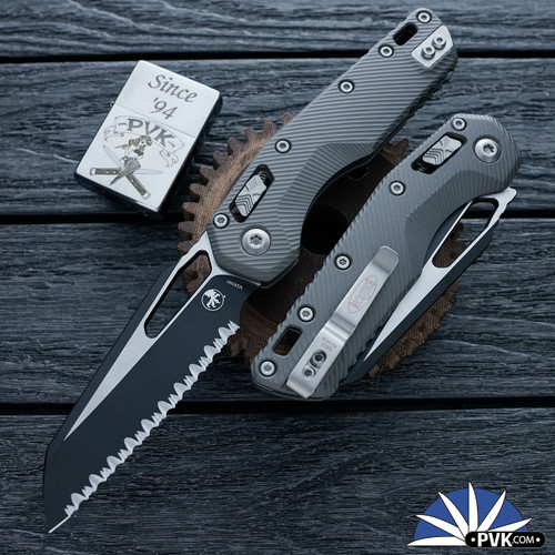 Microtech Standard Issue (MSI) 210-3LNC,  Black Full Serrated Blade, Ram-Lok Frag Aluminum Natural Clear Handle