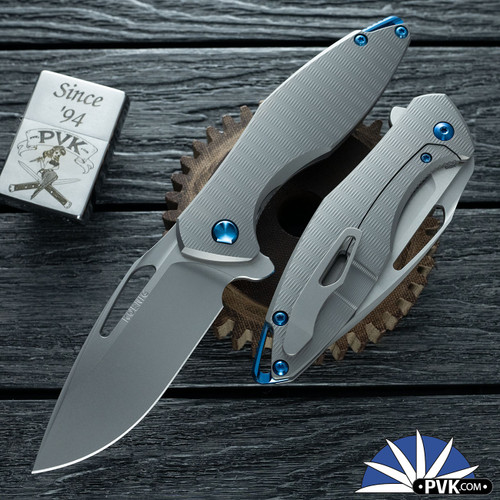 Koenig Knives Arius Flipper, Burnished W/PF Blade, Plexa Patterned Titanium Handles, Blue HW & Spacer W/Blasted Clip