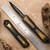 Heretic Knives Manticore-S Double Edge DLC Full Serrated Black Handle w/ Ultem Inlays.