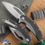 Microtech Matrix 165C-9CFTI Bead Blast M390 Full Serrated Blade, Titanium Handle W/ Carbon Fiber Scales, Bronze Ti Pivot Collars