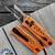 Reate EXO-U Gravity Knife, Razor Blade, Aluminum Speedhole Pattern Orange