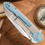 Skiff Made Blades Drifter, Hand Rubbed CPM154, Milled Titanium Scales, Ice Blue Ti Backspacer, Pivot Collar and Clip,  #290