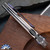 Skiff Made Blades Fugitive, Damasteel (Fafnir Pattern) Blade, Milled Titanium Scales, Royal Blue Ti Backspacer, Black Timascus Pivot Collar and Clip,  #100