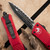 Microtech Combat Troodon 142-3RD Double Edge Black Full Serrated Blade, Red Handle