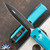 Microtech Ultratech 122-1TQ Double Edge Black Blade, Turquoise Handle