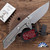 Attn 2 Detail Mark 3 Medium, Magnacut Drop Point Blade, Titanium Handle With Archer Pattern Brass Inlay