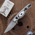 Creely Blades Minnow, Magnacut Clip Point Blade, White G10 Handle, Leather Sheath/ Ulticlip
