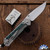 Chris Reeve Large Sebenza 31, Polished Magnacut Drop Point Blade, Titanium Scales W/Magnetic Teal CarboTi Inlays