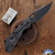 Strider Knives SMF Magnacut Black Drop Point Blade, Grey Flag Engraved Aluminum Top, Flamed Titanium Frame
