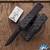 Guardian Tactical Apex, Partial Serrated Dark Stonewashed Magnamax Blade, Black Aluminum Handle W/Carbon Fiber Inlay, 152612