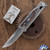 Reate EXO-M Gravity Knife, Satin Elmax Drop Point Blade, Bead Blast Titanium, Multi-Color G10 Damascus Pattern Inlay