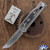Reate EXO-M Gravity Knife, Satin Elmax Tanto Blade, Bead Blast Titanium, Burl Linen Camo Inlay