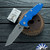 Hinderer 3.5″ Eklipse Skinny Fullered Harpoon Spearpoint, Working Finish Magnacut Blade, Blue G10 Scale, Working Finish Titanium Frame