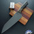 Microtech Kitchen 8" Chef Knife 3000B-1DLCCFS, Black DLC Blade, Bronze Ano Titanium Bolster & Black Carbon Fiber Handles, Signature Series
