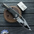 Heretic Knives Custom Wraith V4 Manual, Hand Ground Cracked Ice M390 Bowie Blade, Carbon Fiber Chassis W/ Abalone Button Inlay And Flamed Titanium HW