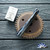 John Gray Slitter V2, Dark Rain Magnacut Bowie Blade, Copper Flake Carbon Fiber Scale And Blue/ Bronze Titanium Clip And FrameLock Lockside W/ Blue HW