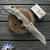 Olamic Cutlery Wayfarer 247, Satin Wharncliffe S90V Blade, Titanium Handles W/Mokume Inlay