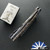John Gray Slitter V2, Dark Rain Magnacut Harpoon Tanto Blade, Purple/ Bronze Chain-link Pattern Titanium Handle And Matching Clip, Blue HW
