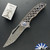 John Gray Slitter V2, Dark Rain Magnacut Harpoon Tanto Blade, Purple/ Bronze Chain-link Pattern Titanium Handle And Matching Clip, Blue HW