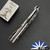 John Gray Slitter V2, Polished Satin Magnacut Harpoon Bowie Blade, Silver Chain-link Pattern Titanium Handle With Matching Clip And HW