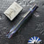 Kyle Vallotton Custom Predator Dual Action, Chad Nichols "Stainless Boomerang" Damascus, Kraken Timascus Bolsters With Brittany Camo Carbon Handle