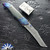 Kyle Vallotton Custom Predator Dual Action, Chad Nichols "Stainless Boomerang" Damascus, Kraken Timascus Bolsters With Brittany Camo Carbon Handle