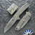 Defiant 7 Servo Manual Flipper, Stonewashed Magnacut Blade, Textured Titanium Handles