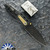 Thermic Tactical Ambient 2026A Liner Lock, Darkwashed M390 Drop Point Blade, Black G10 Handles W/Titanium Accents
