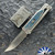 Reate EXO-M Gravity Knife, Satin Elmax Drop Point Blade, Satin Titanium, Heated Titanium Inlay
