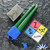 Flytanium Talisong Z, Stonewashed AEB-L Scimitar Blade, Emerald Aluminum Handles