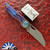 Hypercut Manufacturing Cretin, Dark Stonewashed S45VN Blade, Flamed Anodized Titanium Handle Scales W/ Blue Zirconium Pivot Collar