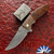 Kirby Lambert Custom Cutlass Folder, Damasteel Trailing Point Blade, Bronze Zirconium Bolsters, Desert Ironwood Handle, Pearl Inlayed Pivot And Zirconium Pocket Clip