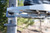 XtraArm Hang-On Rest mounted to hang-on treestand frame for rifle support