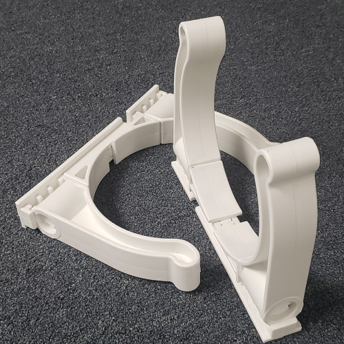 Lighthouse Industries Roll Control adjustable fold-down scuba tank brackets in polypropylene, shown installed on aluminum track with scuba tank