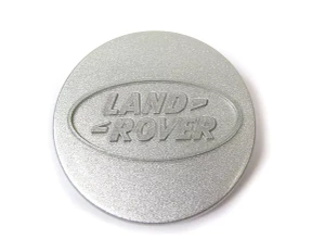 Genuine Wheel Center Cap ANR2391MNH, Silver With Land Rover Logo, For Land Rover Discovery I, Defender 90 And 110, And Range Rover Classic, Per Each (See Fitment Years)