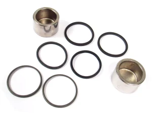 Rear Brake Caliper Piston Kit SEE500140, For One Side Of Axle, On Land Rover Discovery I, Defender 90, And Range Rover Classic (See Fitment Years)