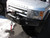 Integrated Steel Front Bumper And Winch Kit For Land Rover LR3, Includes 5MM Steel Bumper, Terrafirma A12000 12,000 Lb Winch, Wipac Fog Lights And Aluminum Washer Bottle