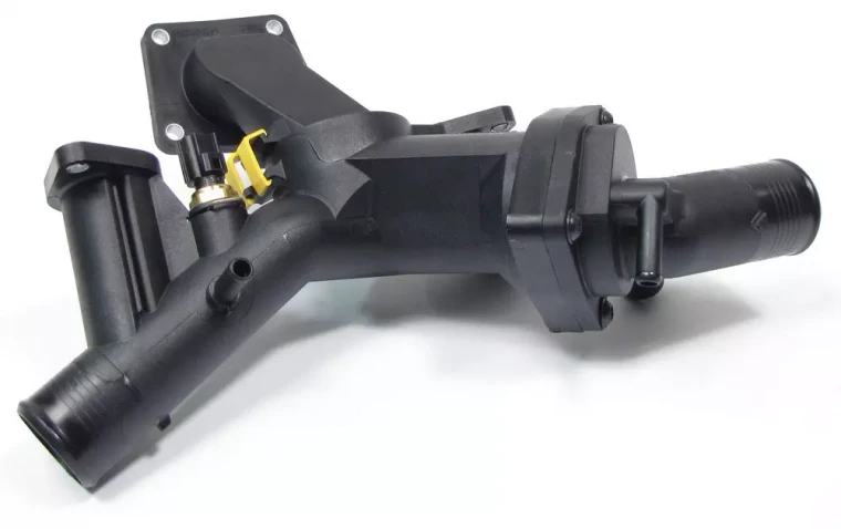 Engine Thermostat And Housing Assembly LR005631 (Includes Thermostat) For Land Rover LR3 And Range Rover Sport, 2005 - 2009 (See Fitment Notes)