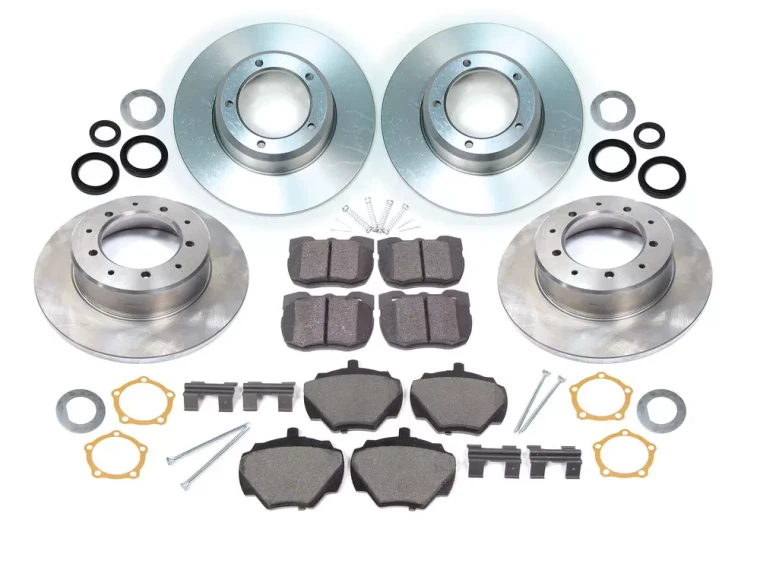 Front And Rear Brake Rebuild Kit For Land Rover Discovery I, Includes Genuine Pads, Standard Rotors And Replacement Hardware And Seals