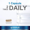 One capsule beside a glass of water, 1 capsule 2 times daily graphic