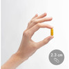 Hand holding a Fermented Turmeric capsule shown at 2.3 cm for size reference