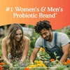 Couple gardening among flowers, Garden of Life probiotic brand graphic