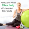 Woman with an exercise ball, unflavored powder mixes easily, 20 stick packets