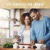 Couple preparing food in a kitchen, live probiotics and enzymes graphic