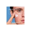 Man with sunscreen dot on his cheek