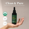 Hand holding the Vein Health bottle, clean and pure graphic with USDA Organic, non-GMO and gluten-free icons