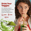 Woman sipping a green drink, drink your veggies graphic with a scoop of powder