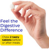 Hand holding a chewable tablet, chew 2 tasty tablets before or after meals graphic