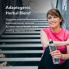 Woman with a water bottle resting on outdoor steps, adaptogenic herbal blend text