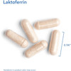 Close-up of Laktoferrin capsules with size marking